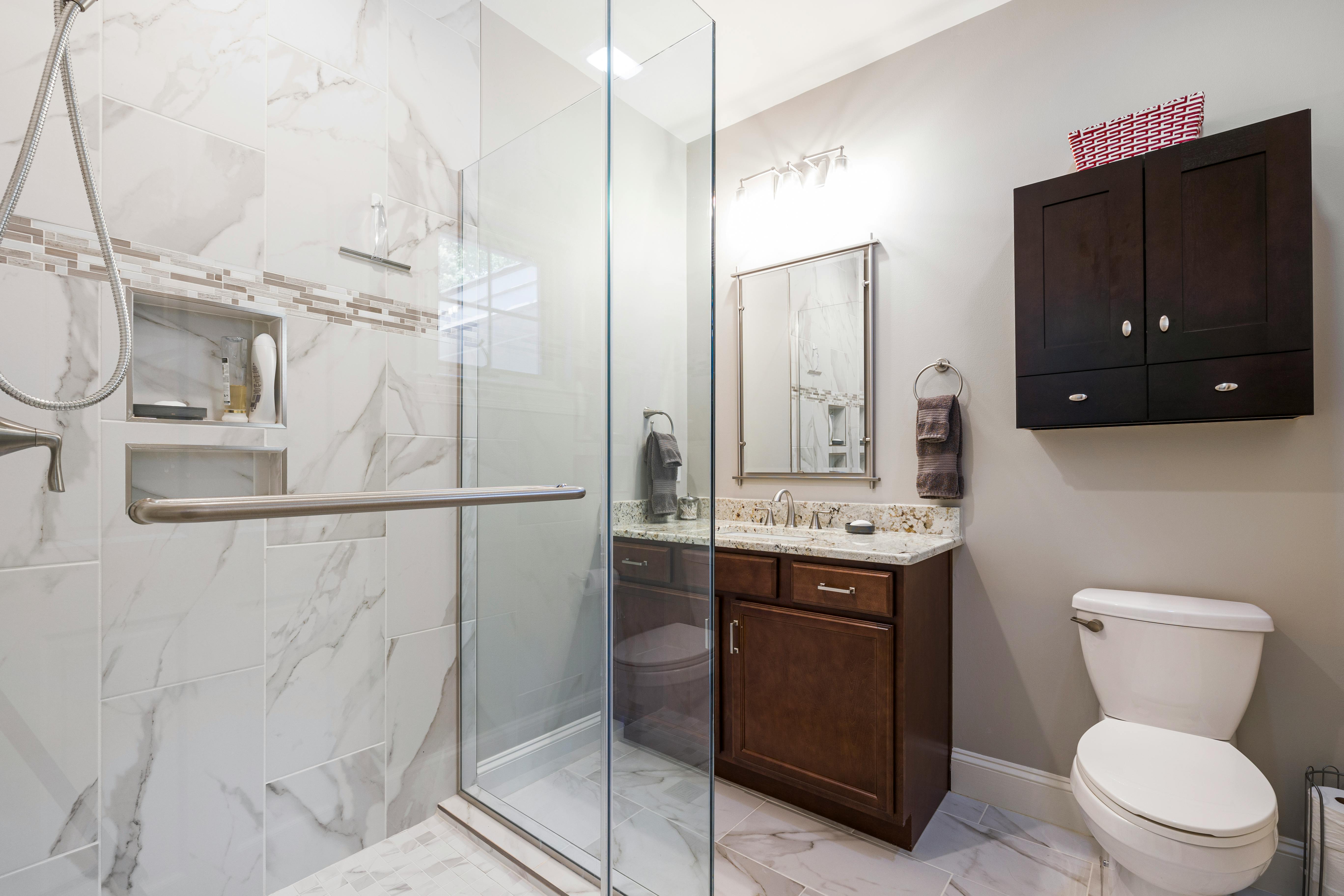 Elegant Bathrooms with Sleek Mirrors and Cabinets