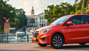 Experience car hire in Kuching with a scenic waterfront view featuring a rental car against lush greenery.